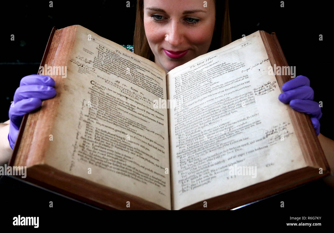 Exhibitions officer Kirsty MacNab, from the University of Edinburgh, takes a closer look at a unique volume of 17th Century plays by dramatist Ben Jonson which is on display in a new exhibition 'Rare Books : Expect the Unexpected' at the university's main library in Edinburgh. Stock Photo