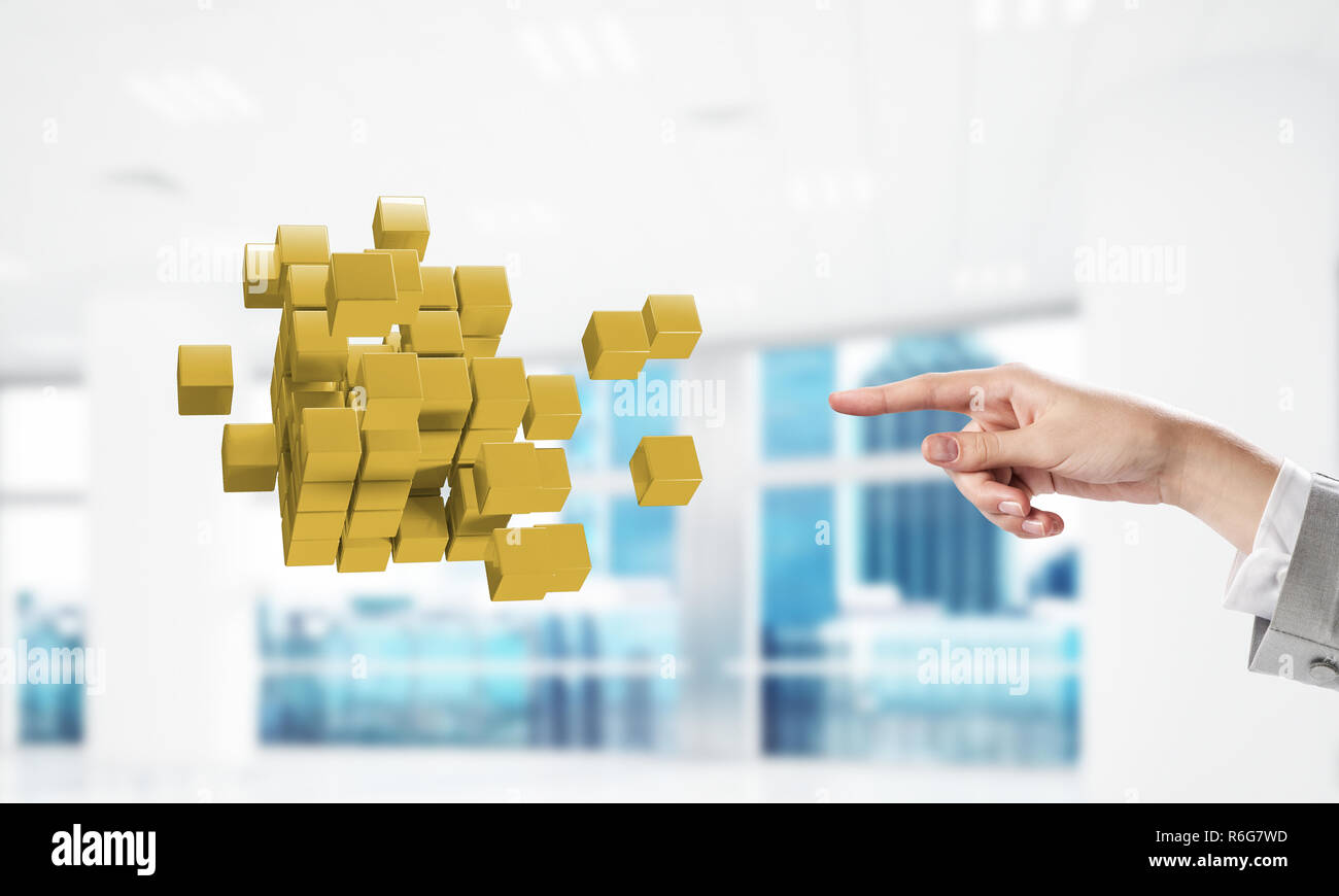 Integrating new technologies concept with cube figure floating i Stock Photo