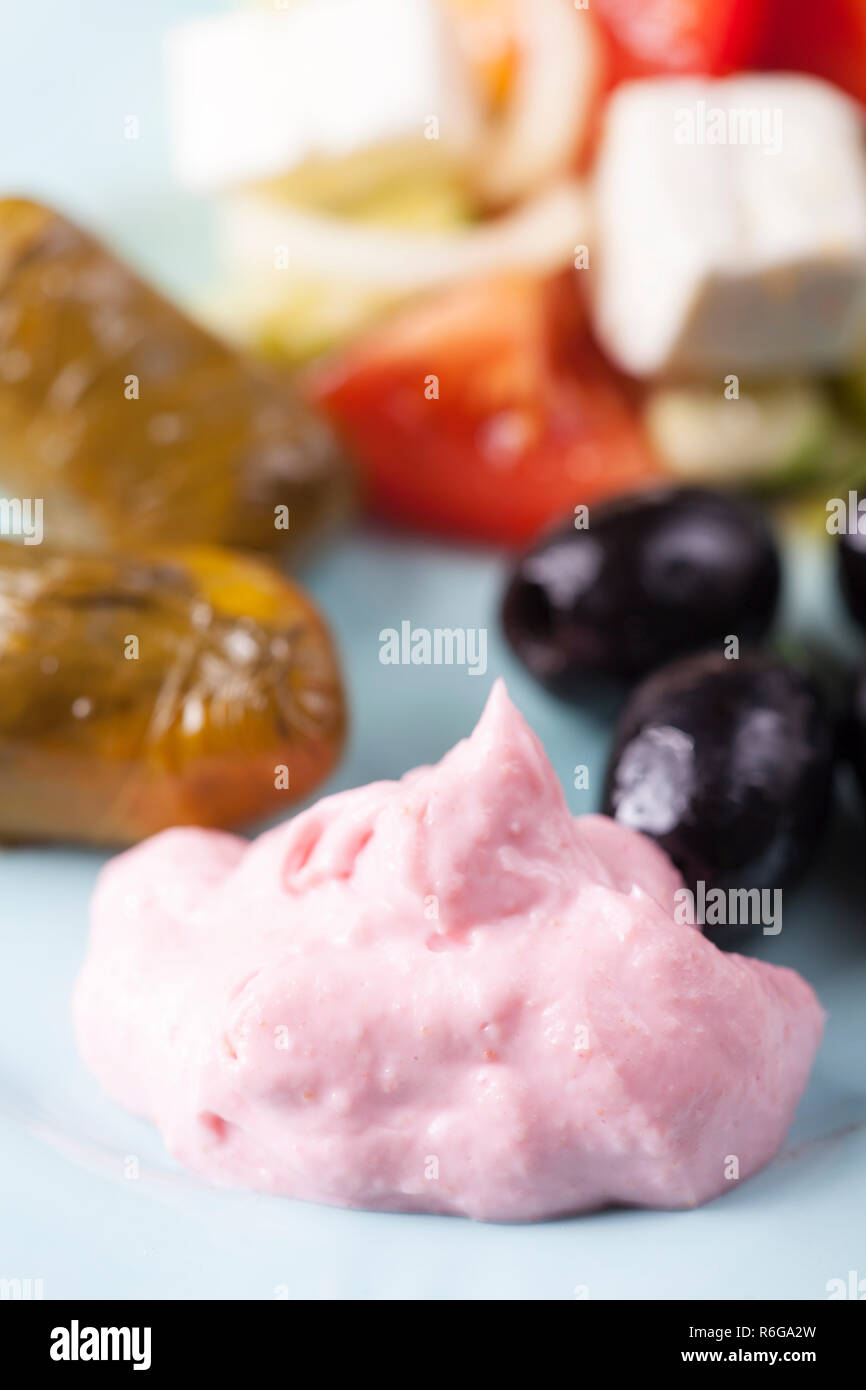 greek taramas and stuffed grape leaves with salad Stock Photo - Alamy