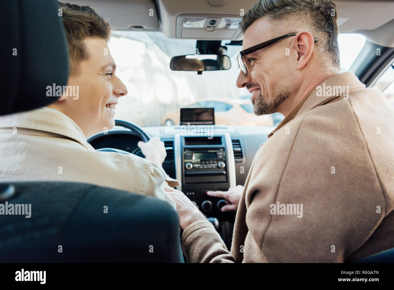 Father teen son in car hi-res stock photography and images - Alamy