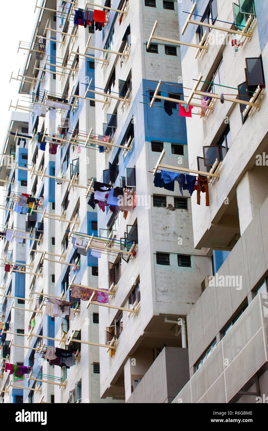 Back View Of Singapore HDB Flat, Showing Laundry Hanging On The Pole ...