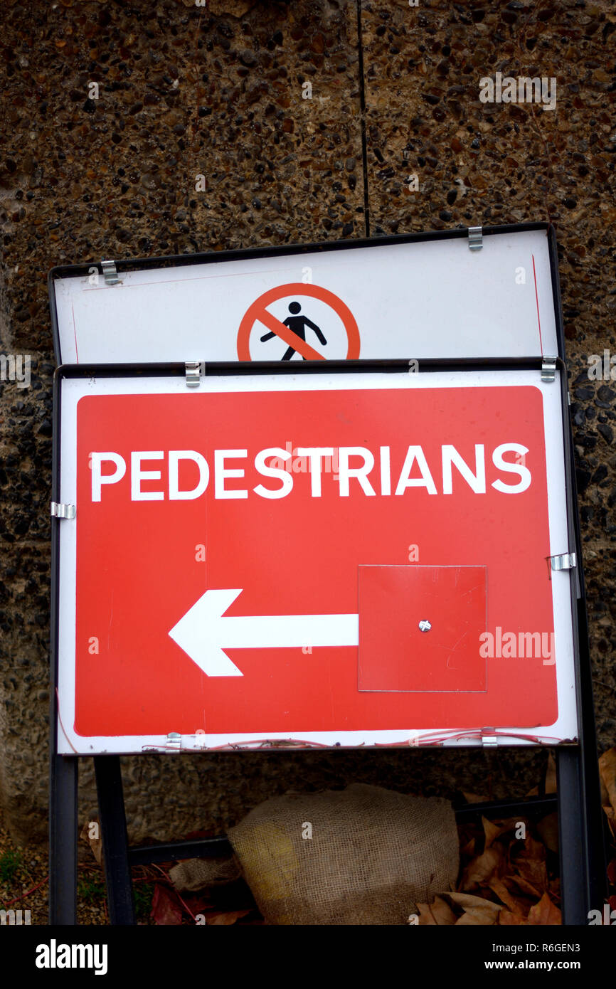 'Pedestrians this way' sign by roadworks, London, England, UK. Stock Photo