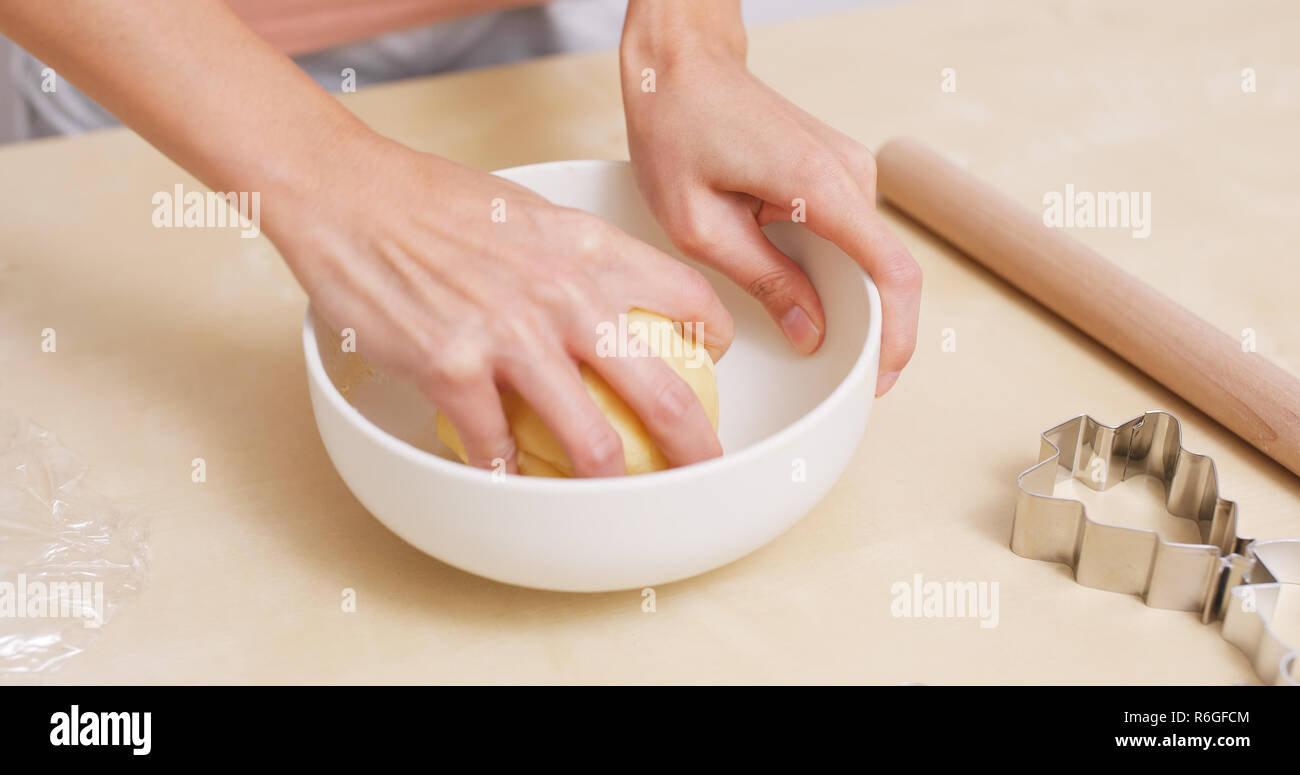 Mixing dough by hand Stock Photo Alamy