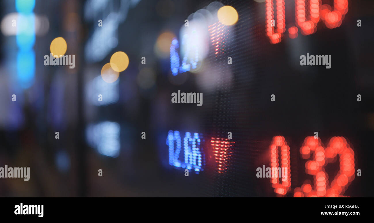 Stock market display in the city at night Stock Photo - Alamy