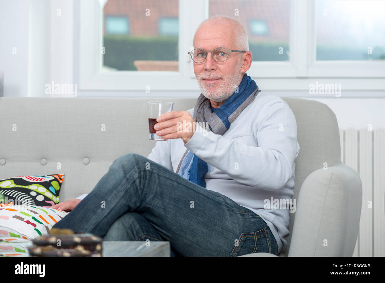 alcohol and beverage concept - older man smelling red wine Stock Photo ...