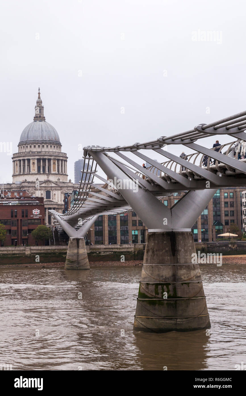 A foggy,misty view over the The Millenium Bridge and St.Pauls Cathedral in London,England,UK Stock Photo