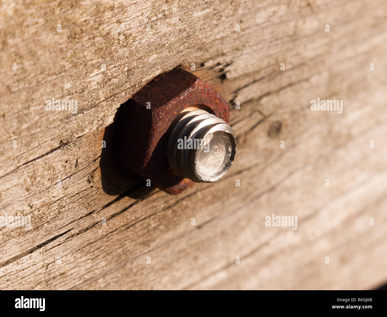 close up of large rusty bolt and screw head Stock Photo