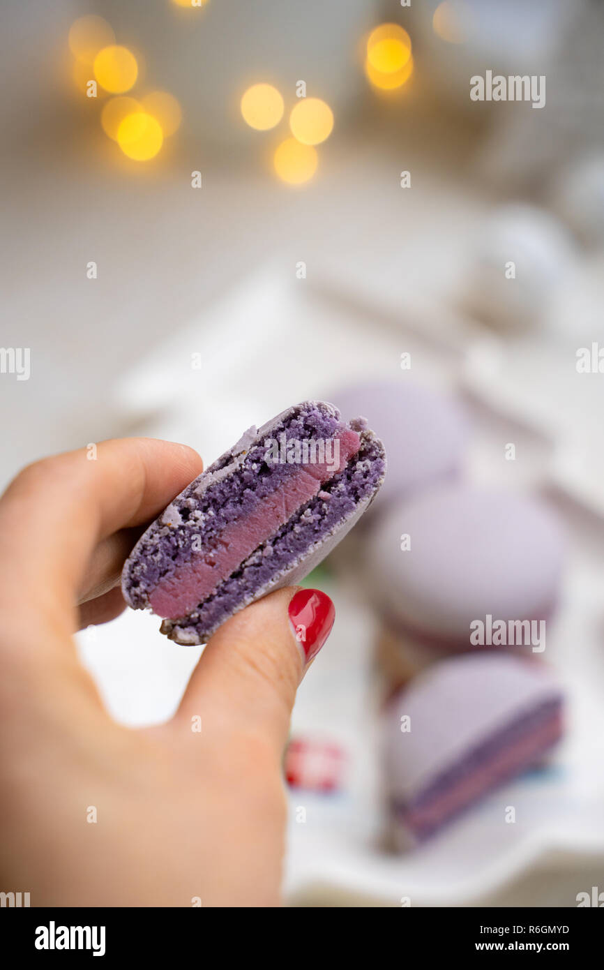 macaroons with currants on a white plate with jam Stock Photo