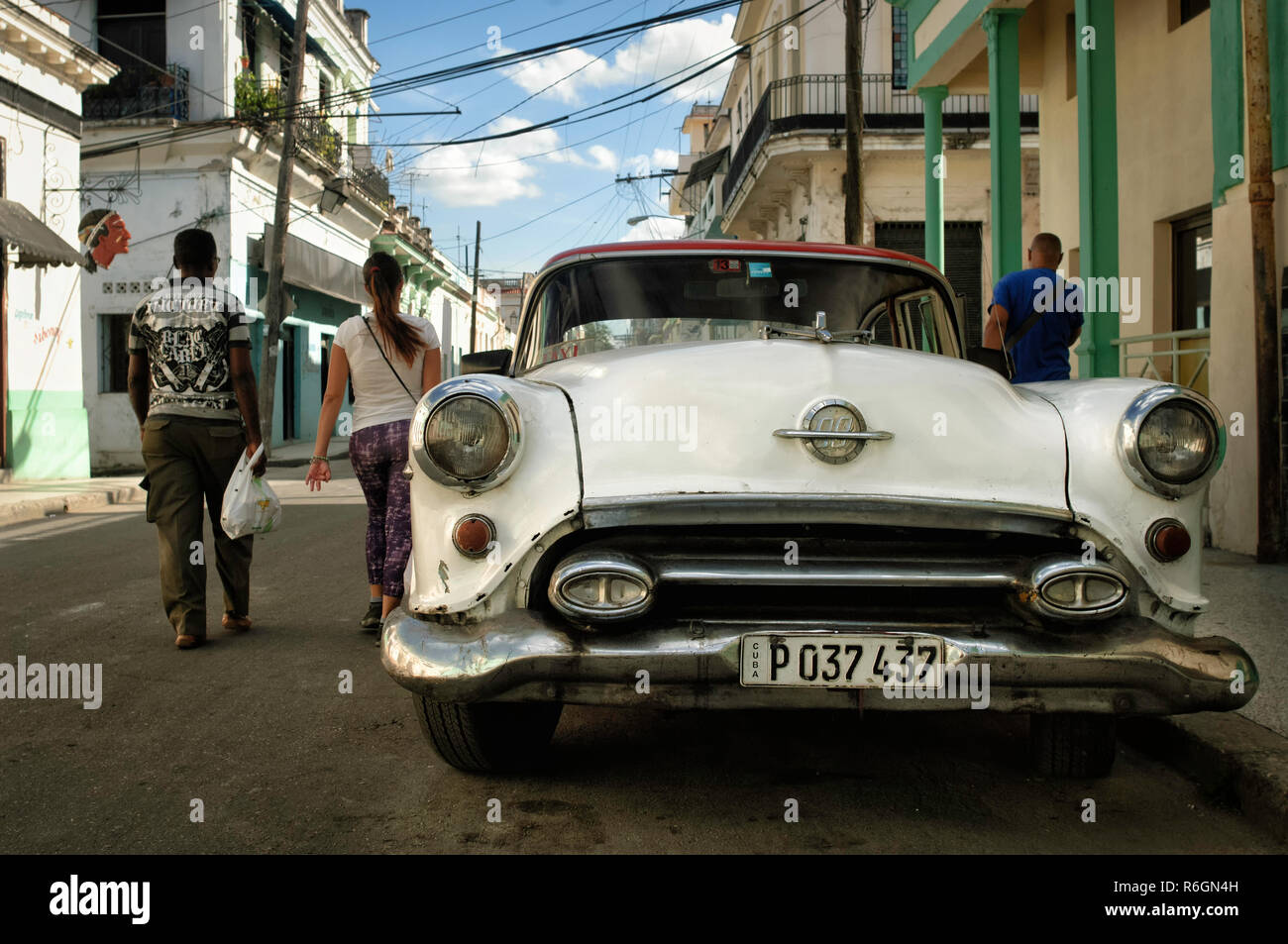 Classic white car on the streets of Regla island, Cuba Stock Photo