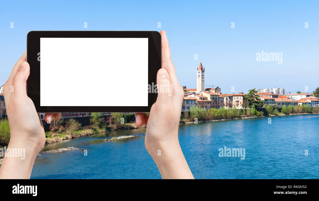 tourist photographs waterfront in Verona Stock Photo Alamy