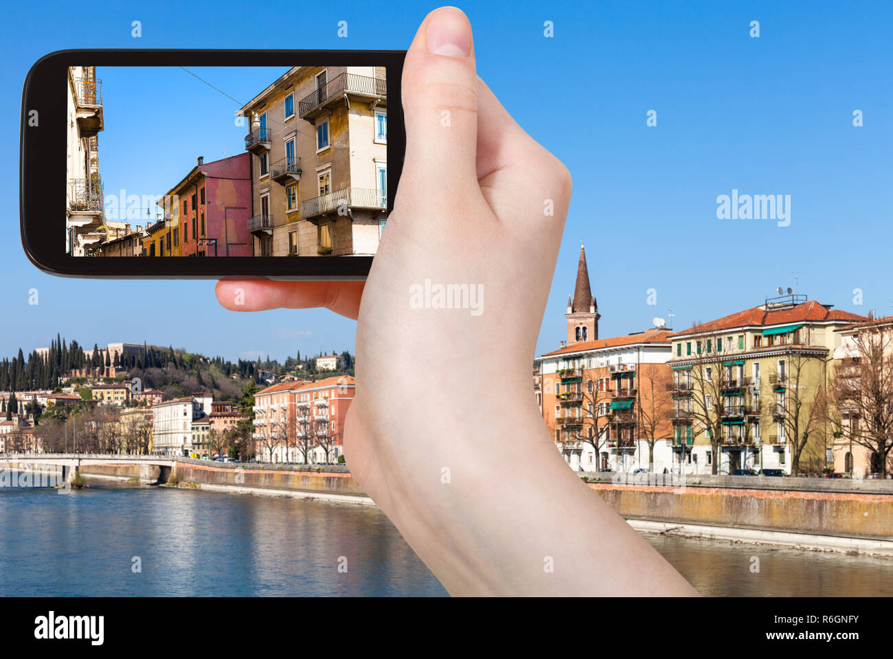 tourist photographs urban houses in Verona Stock Photo Alamy