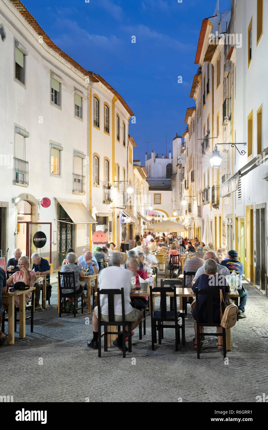 Restaurants at night along the Alcarcova de Baixo, Evora, Alentejo, Portugal, Europe Stock Photo