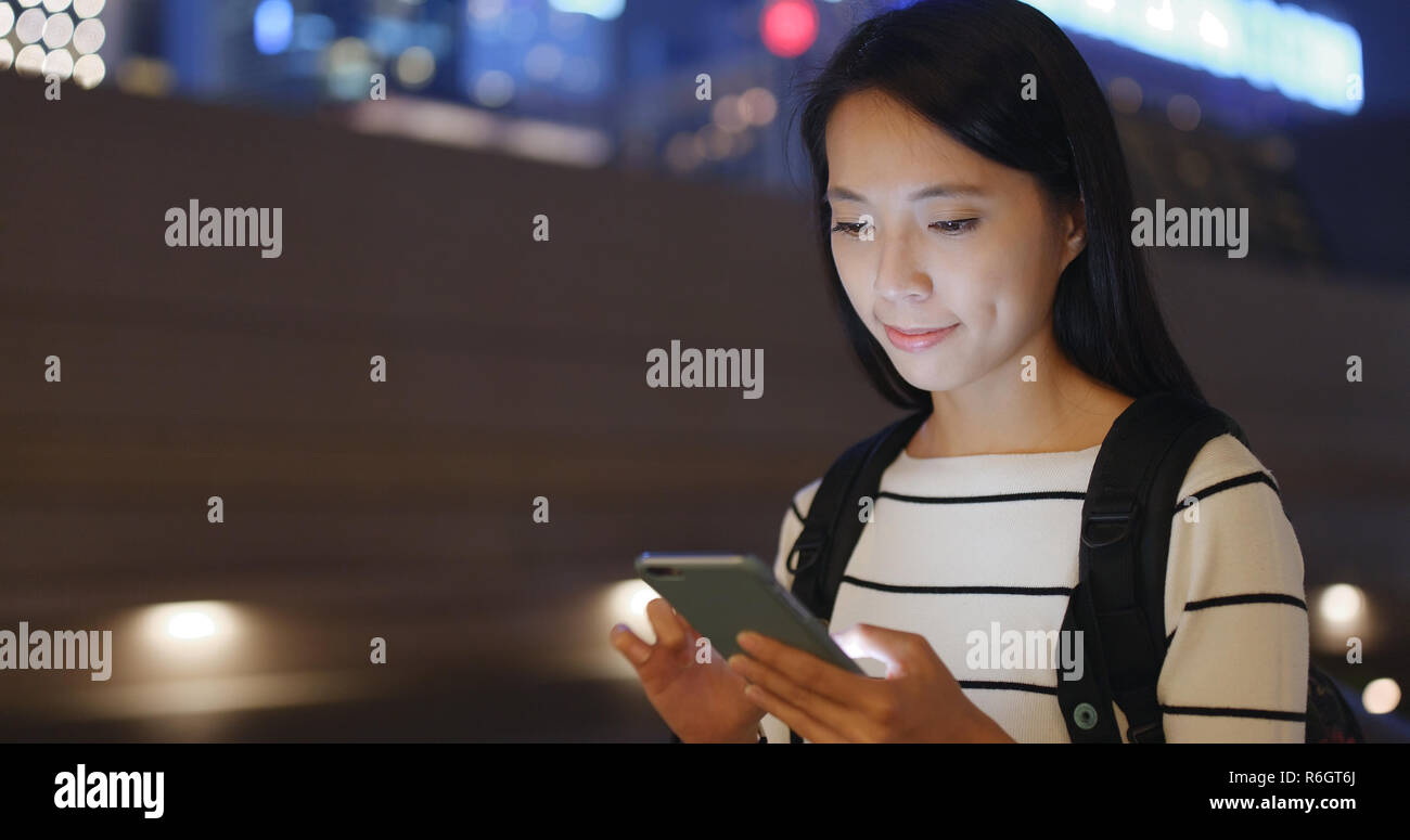 Woman use of mobile phone in Hong Kong Stock Photo - Alamy