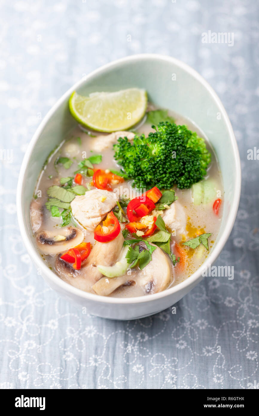 thai tom kha gai soup in a bowl Stock Photo Alamy