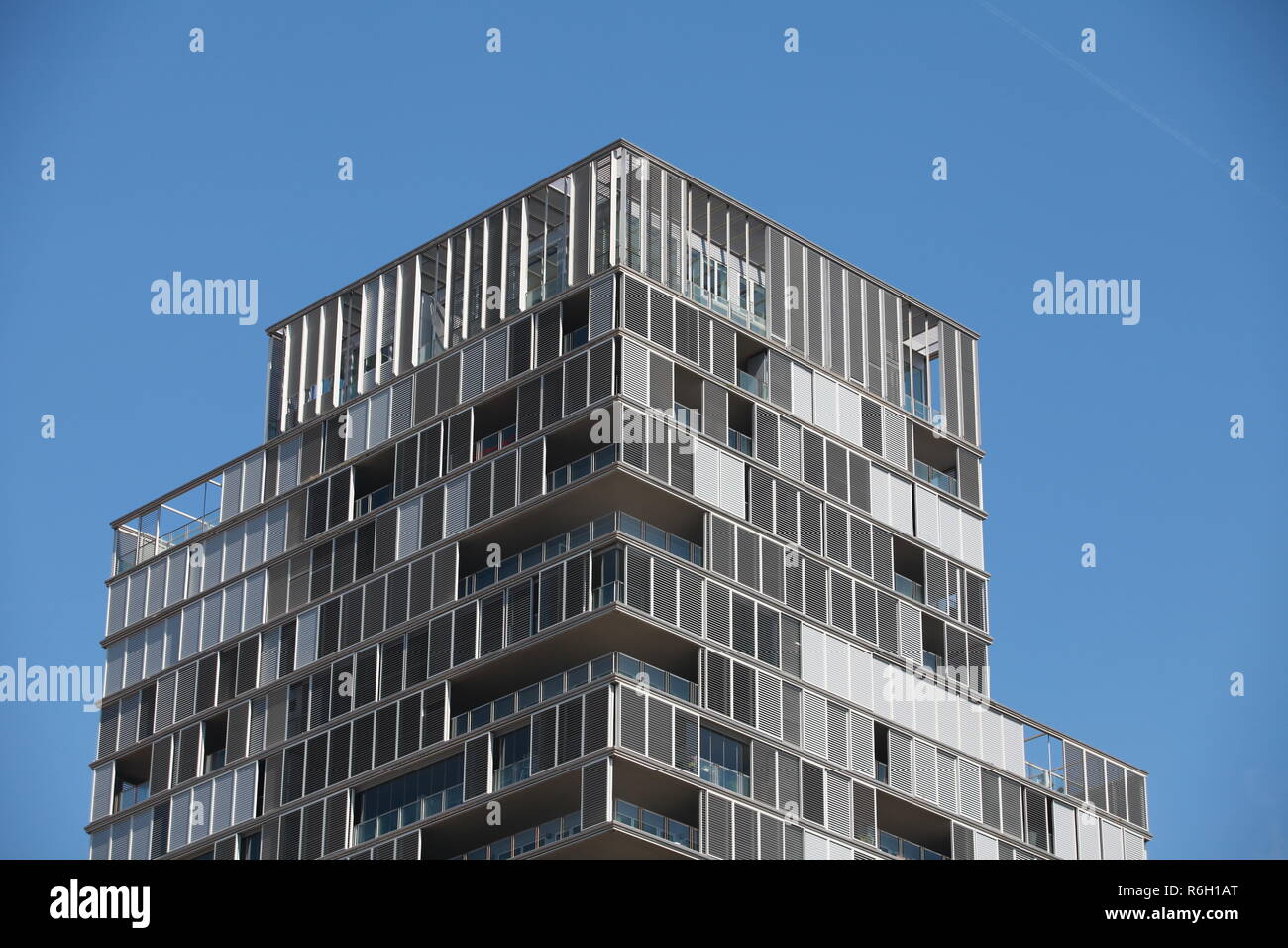 New modern building on blue sky Stock Photo - Alamy