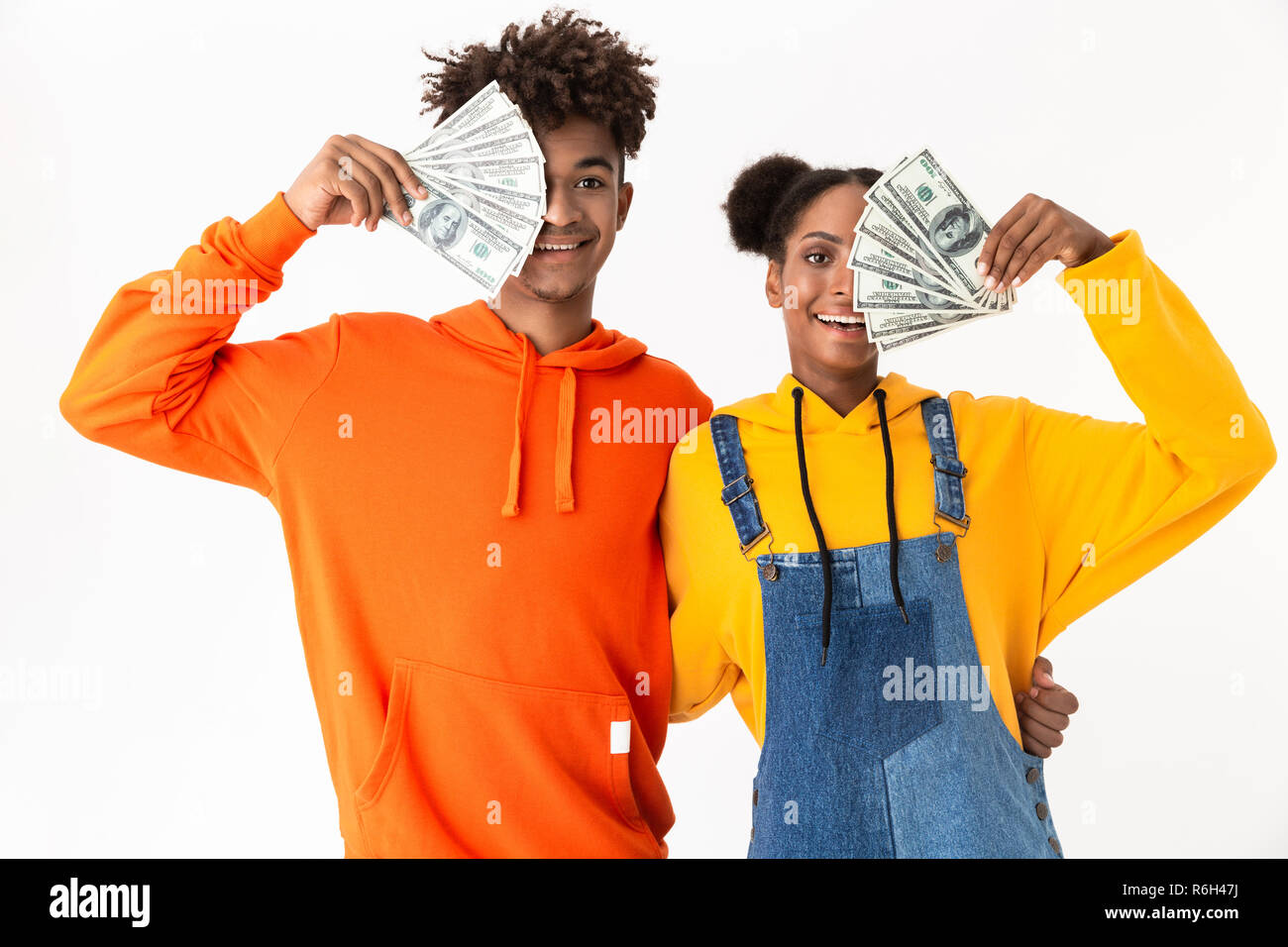 Portrait of a two happy young african couple isolated over white ...