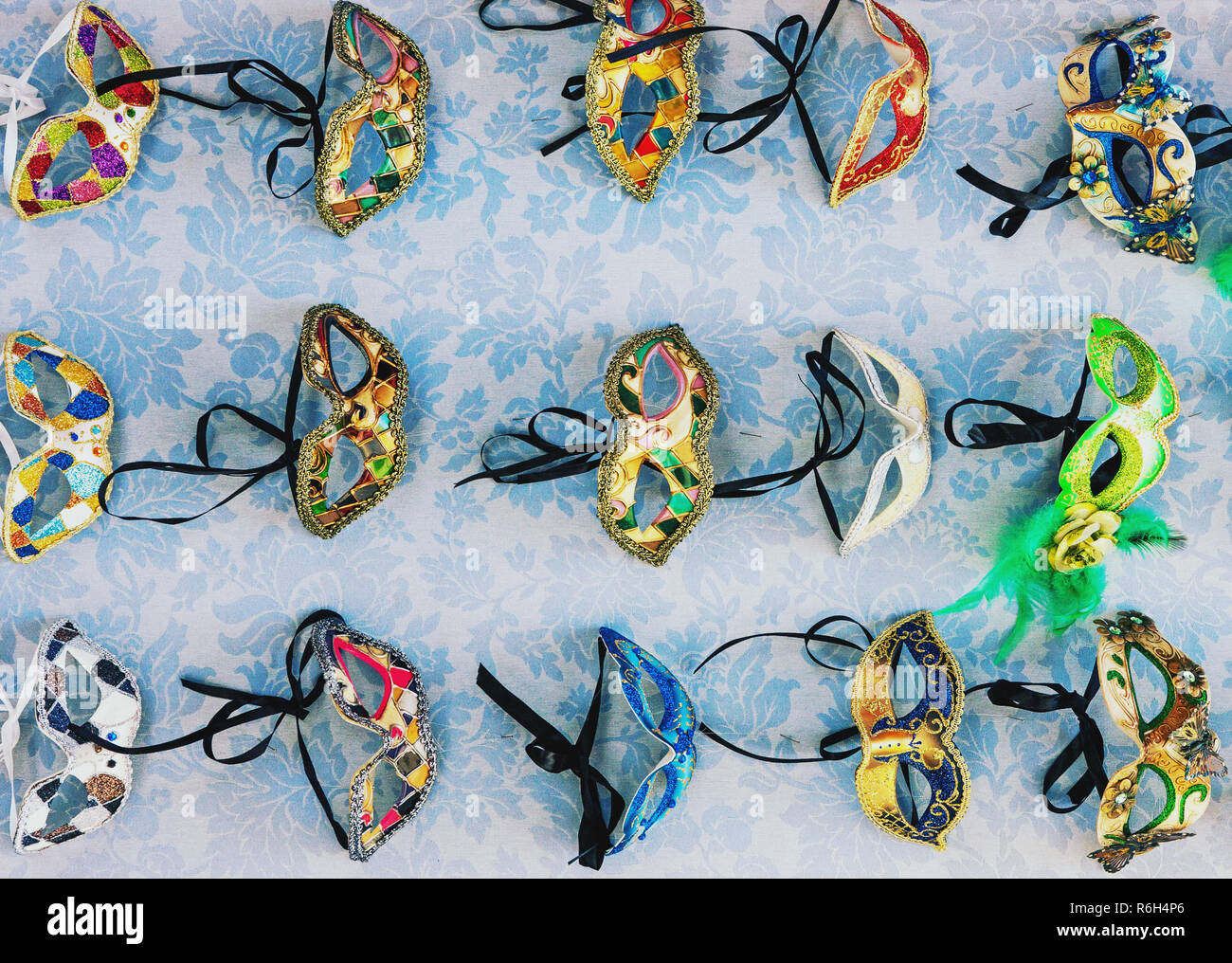 Traditional colorful decorated venetian masks for sale in Venice Stock Photo