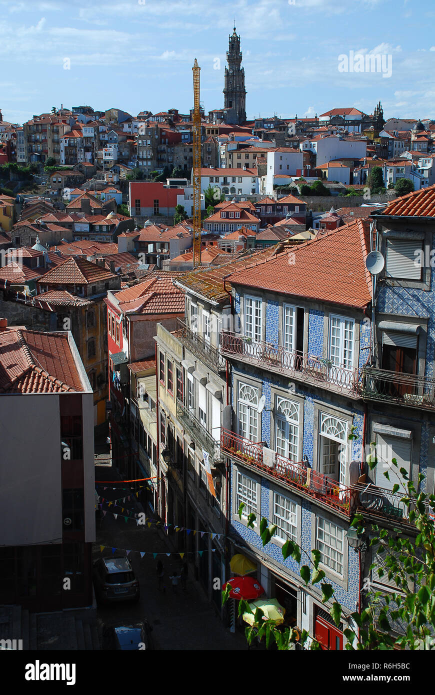 Colored facades and roofs of houses in Porto, Portugal. In the middle the Clerigos Church (Portuguese: Igreja dos Clerigos), Porto, Portugal Stock Photo