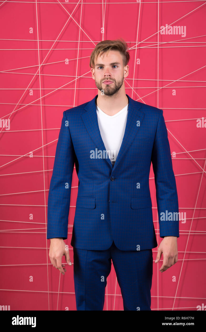 Man or businessman wear classic dark blue suit. Menswear and stylish  wardrobe concept. Male fashion. Man formal clothing looks handsome and  confident. Proper outfit influence reputation in society Stock Photo - Alamy