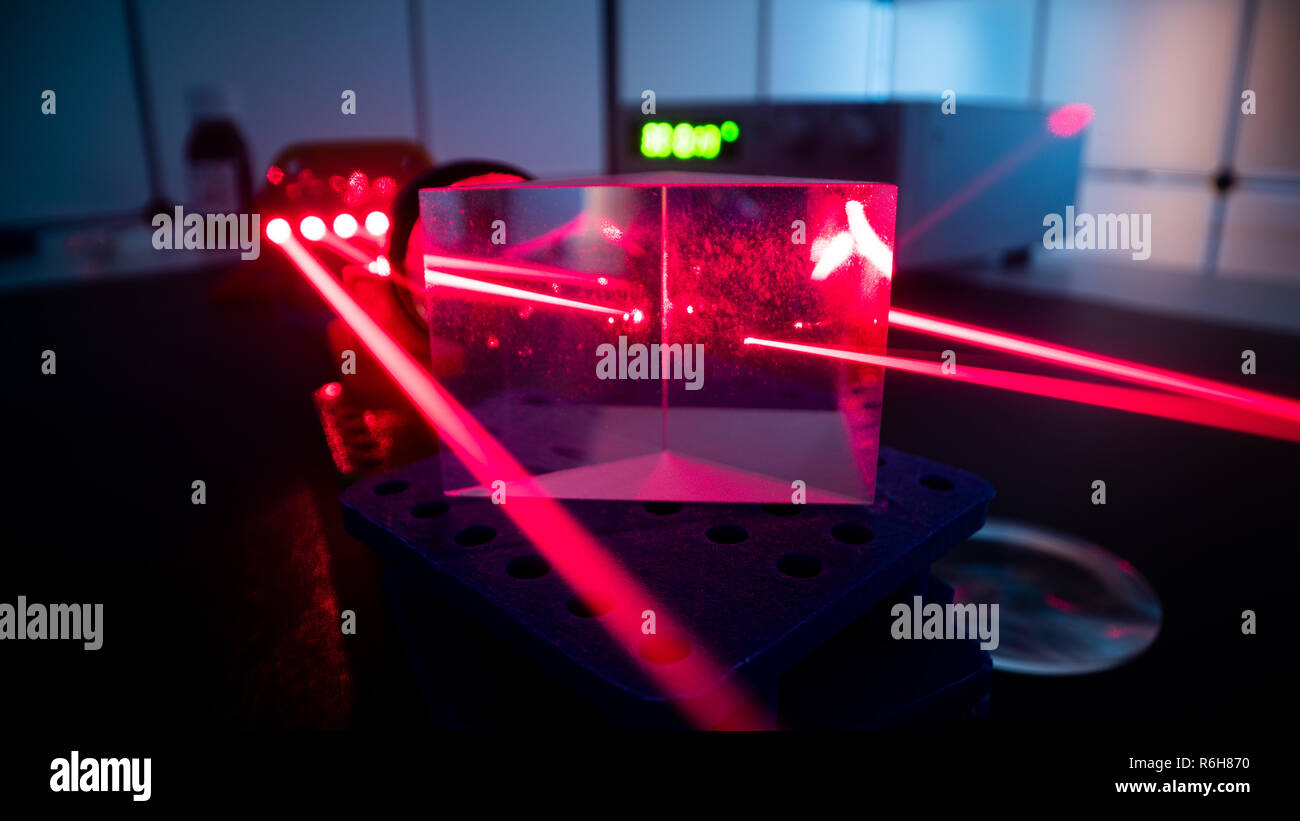 Experiment with red laser in optics lab Stock Photo