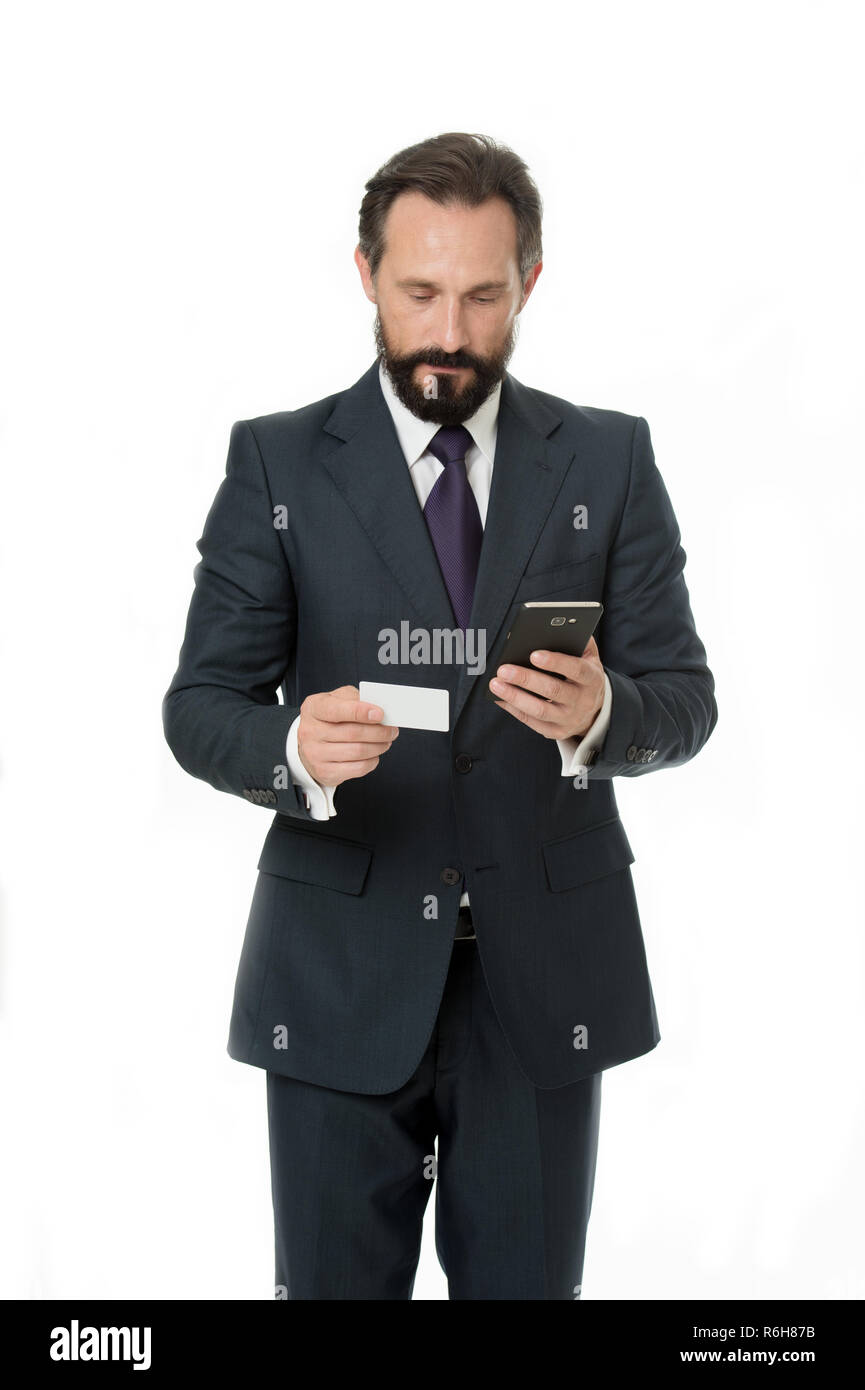 Online payment is easy. Man hold smartphone and use credit card for online shopping. Business manager do mobile payment. I am a man of business nothing more. Stock Photo