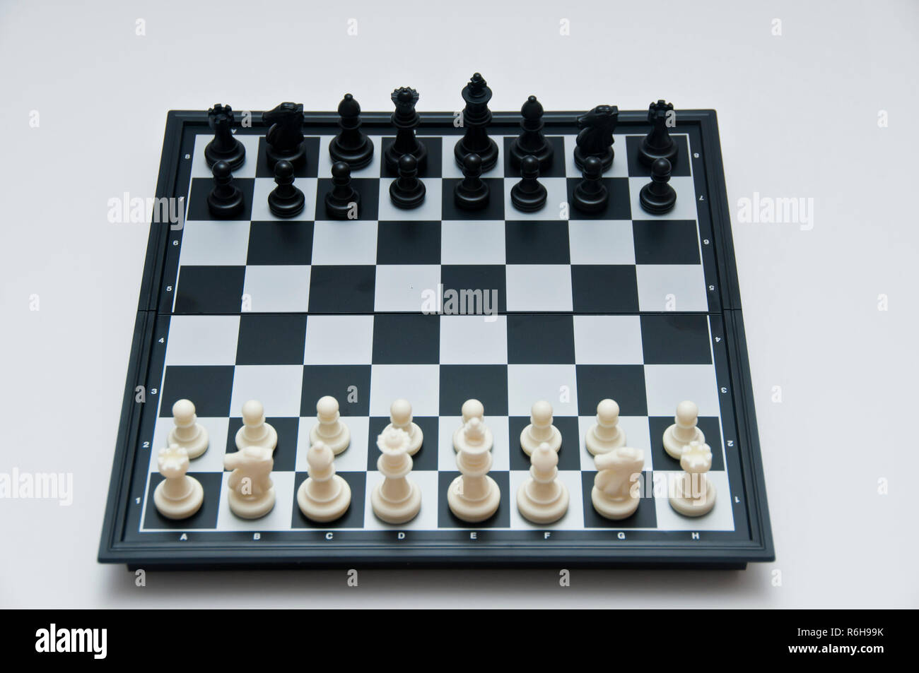 Chess Pieces In Starting Position On A Wooden Board Stock Photo - Download  Image Now - iStock