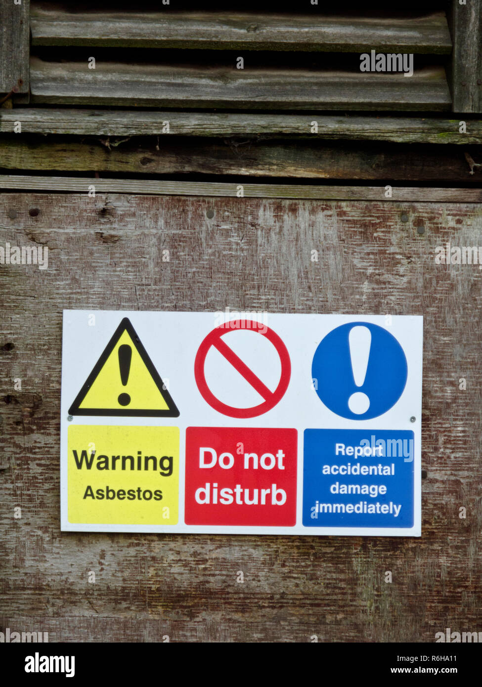 Health & Safety Warning Signs for Asbestos and Do Not Disturb, UK Stock Photo