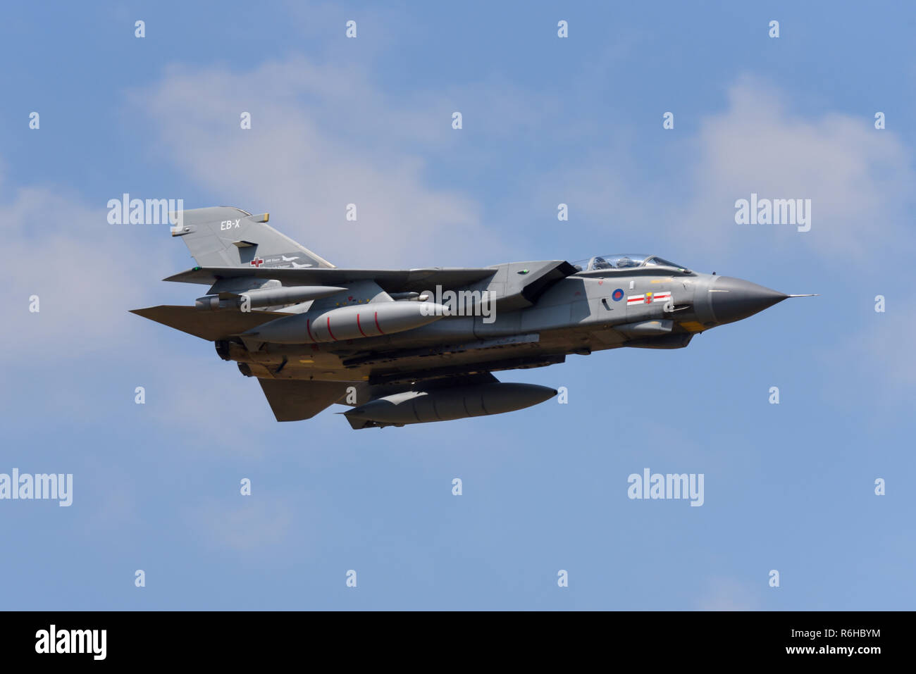 Royal Air Force RAF Panavia Tornado GR4 jet fighter bomber plane flying at Royal International Air Tattoo, RIAT, RAF Fairford airshow. Fast. Speed Stock Photo