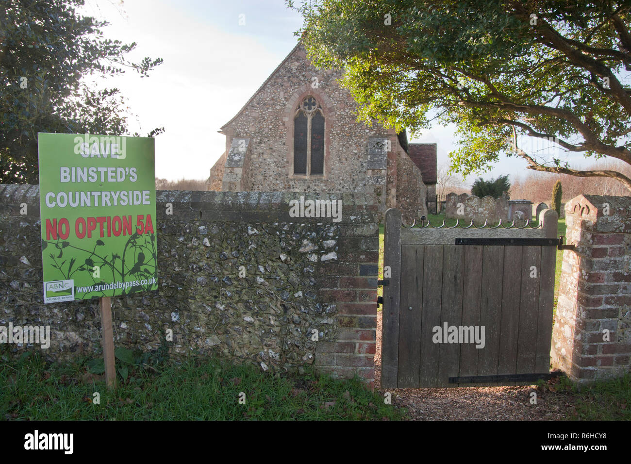 No Option 5A protest sign outside St. Mary's church objecting to the new Arundel bypass, Binsted, West Sussex. Binsted is a village steeped in folklor Stock Photo