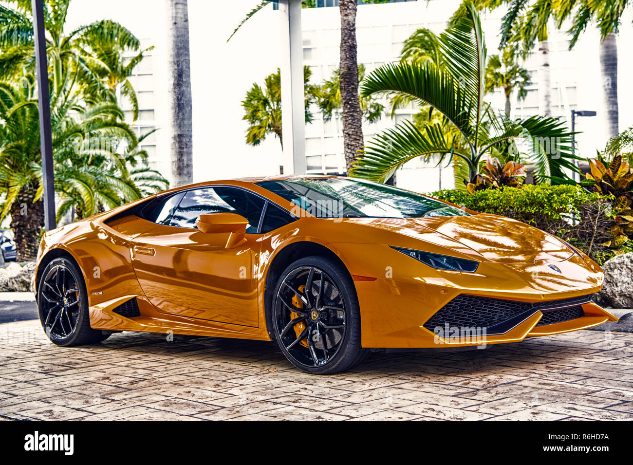 Miami, Florida, USA-February 19, 2016: Supercar Lamborghini Aventador  orange color parked next to Ocean drive at South bech at Miami, Florida.  Lamborghini is famous expensive automobile brand car Stock Photo - Alamy