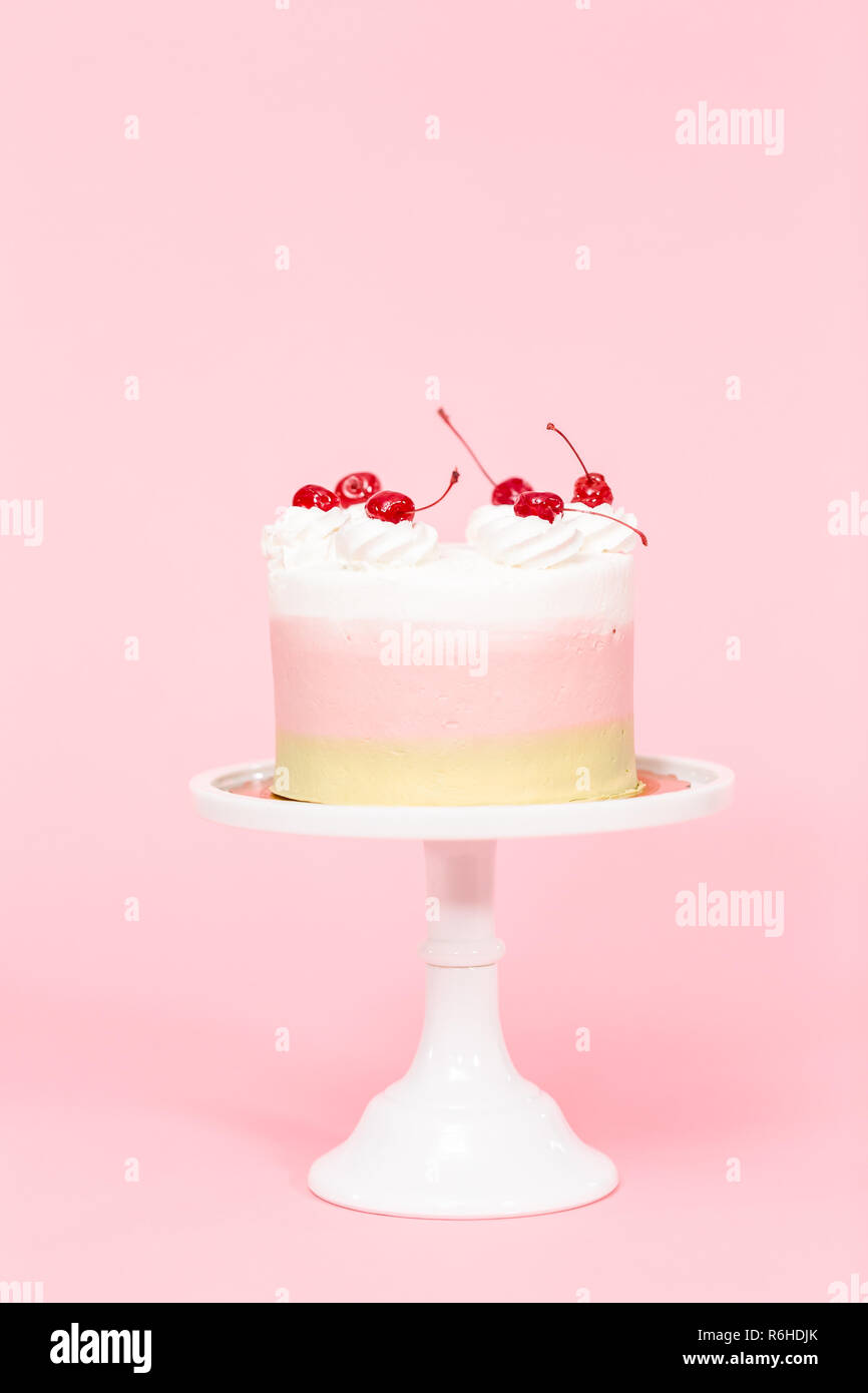 Birthday Spumoni cake on pink background. Stock Photo