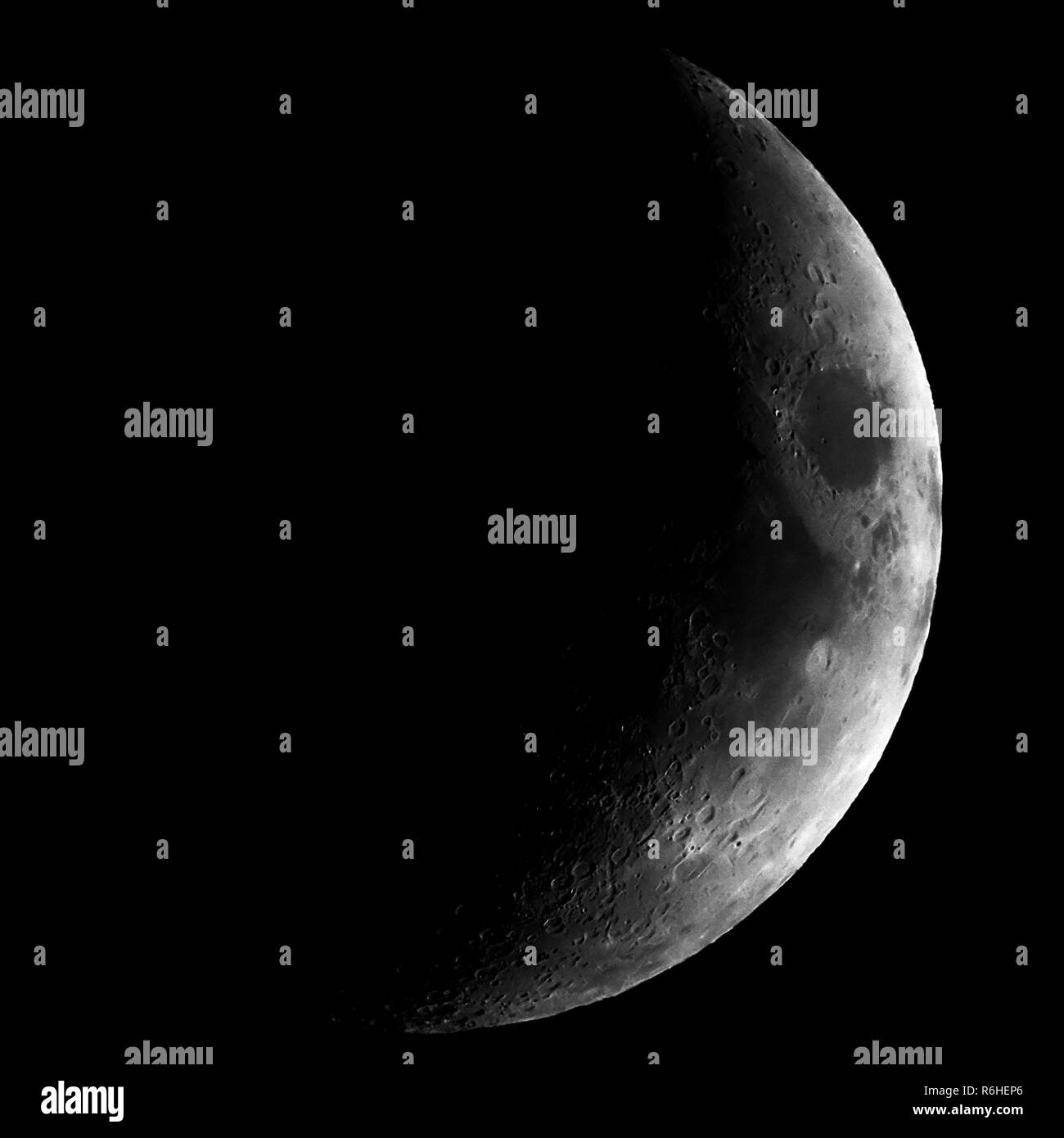 High contrast Waxing crescent moon seen with telescope Stock Photo Alamy