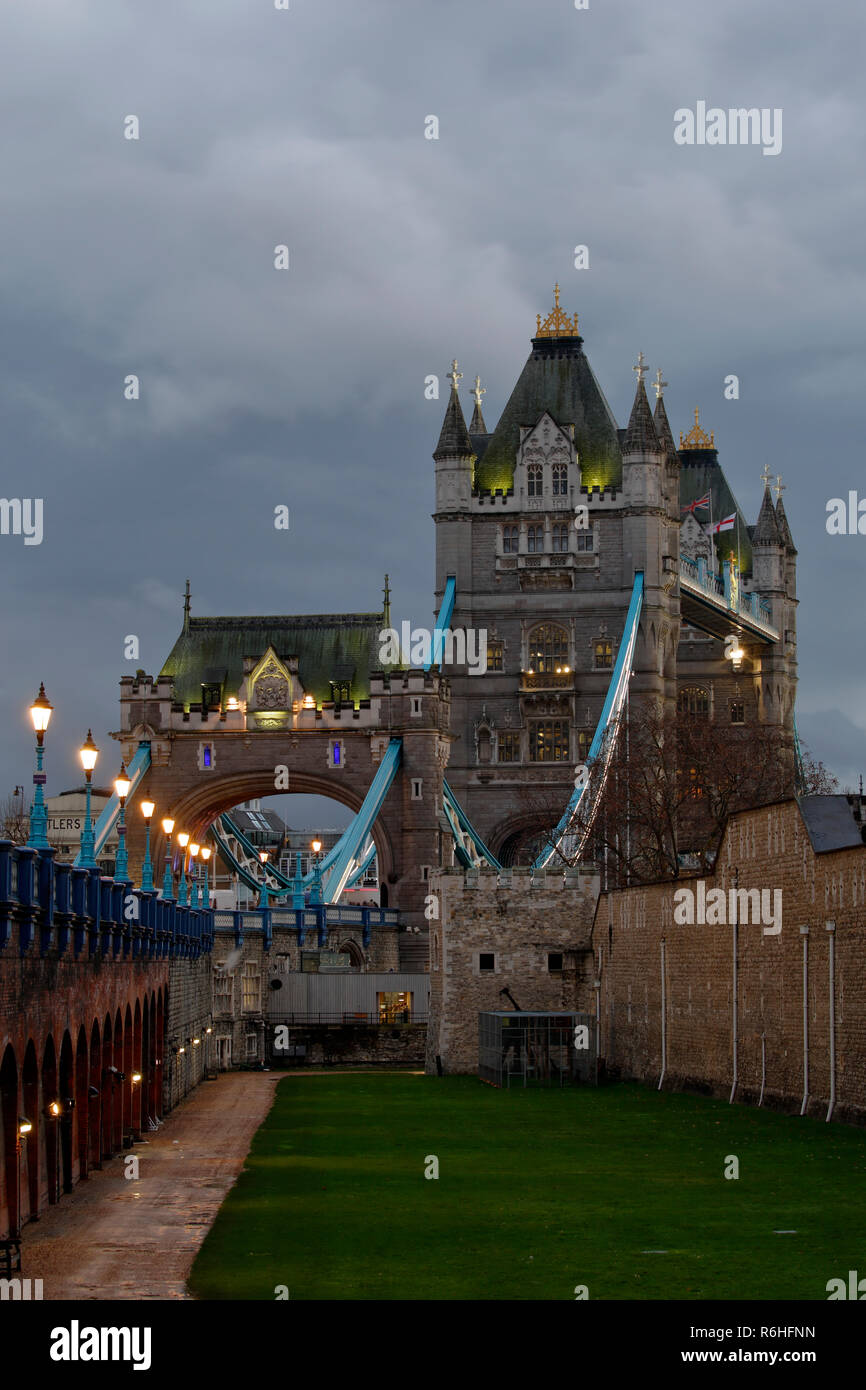 Tower Bridge as viewed along the moat of The Tower Of London, at