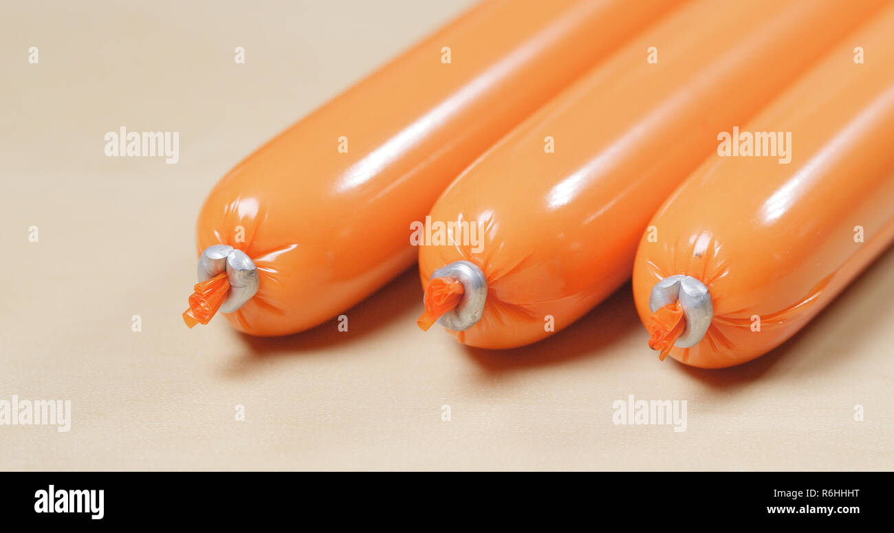 Snack sausage with plastic wrapping Stock Photo Alamy