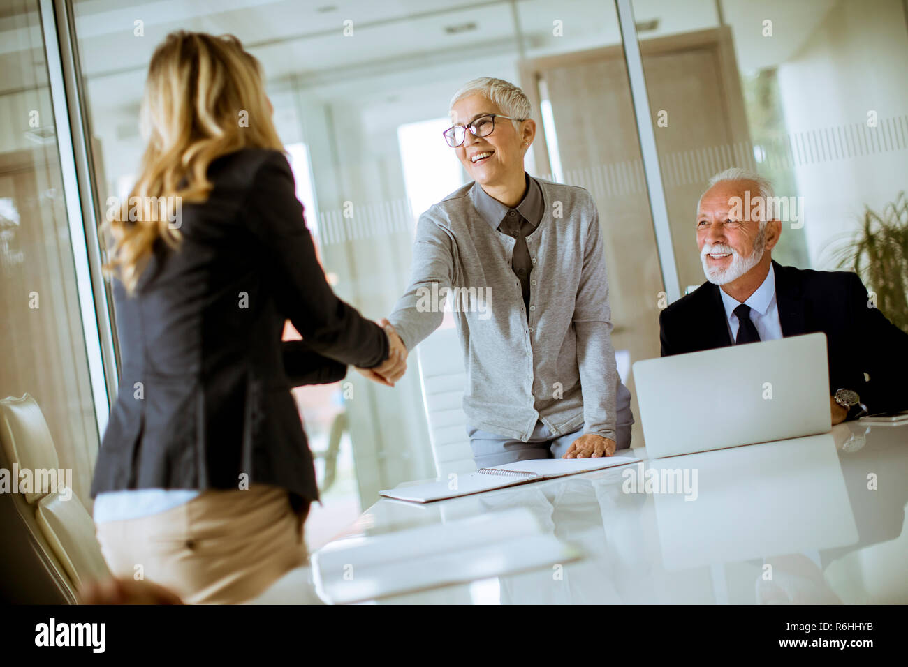 Business people successfully completed the meeting Stock Photo - Alamy
