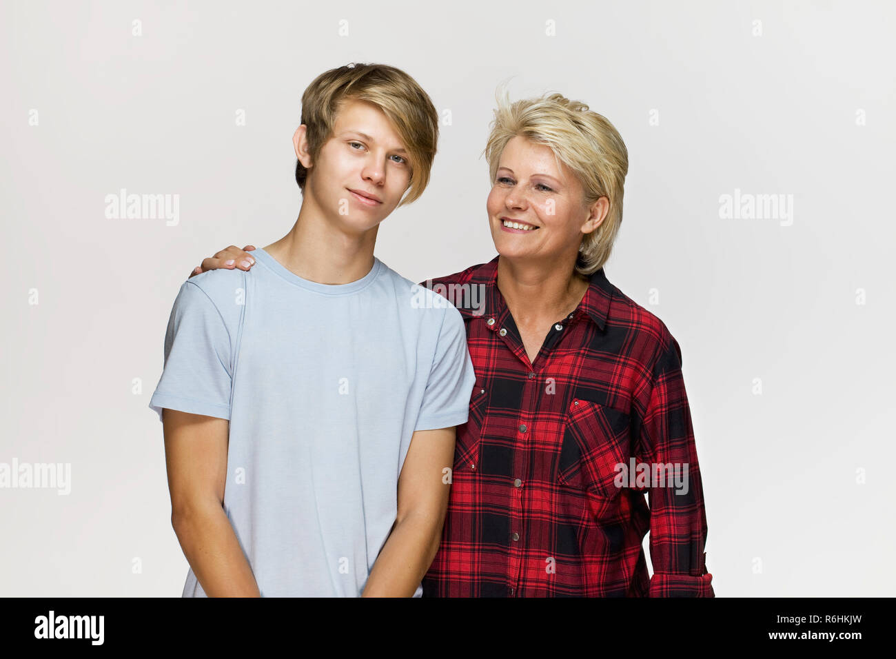 Family portrait. Smiling mother and son wearing casual clothing Stock Photo