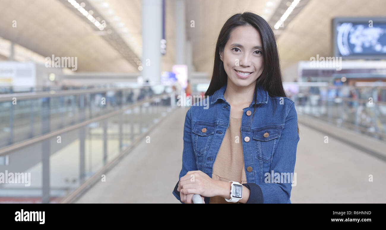 Woman travel in Hong Kong airport Stock Photo - Alamy