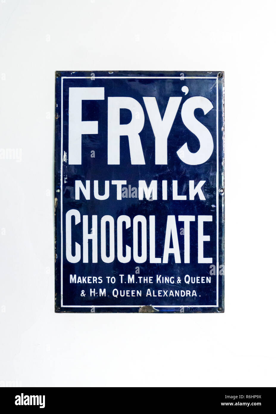 An old metal advertisement for Fry's Nut Milk Chocolate. Stock Photo