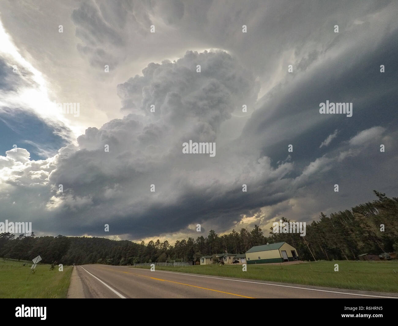 Severe rotating thunderstorm over the Black Hills in South Dakota. This supercell storm dropped very large hail, up to three inches in diameter. Stock Photo