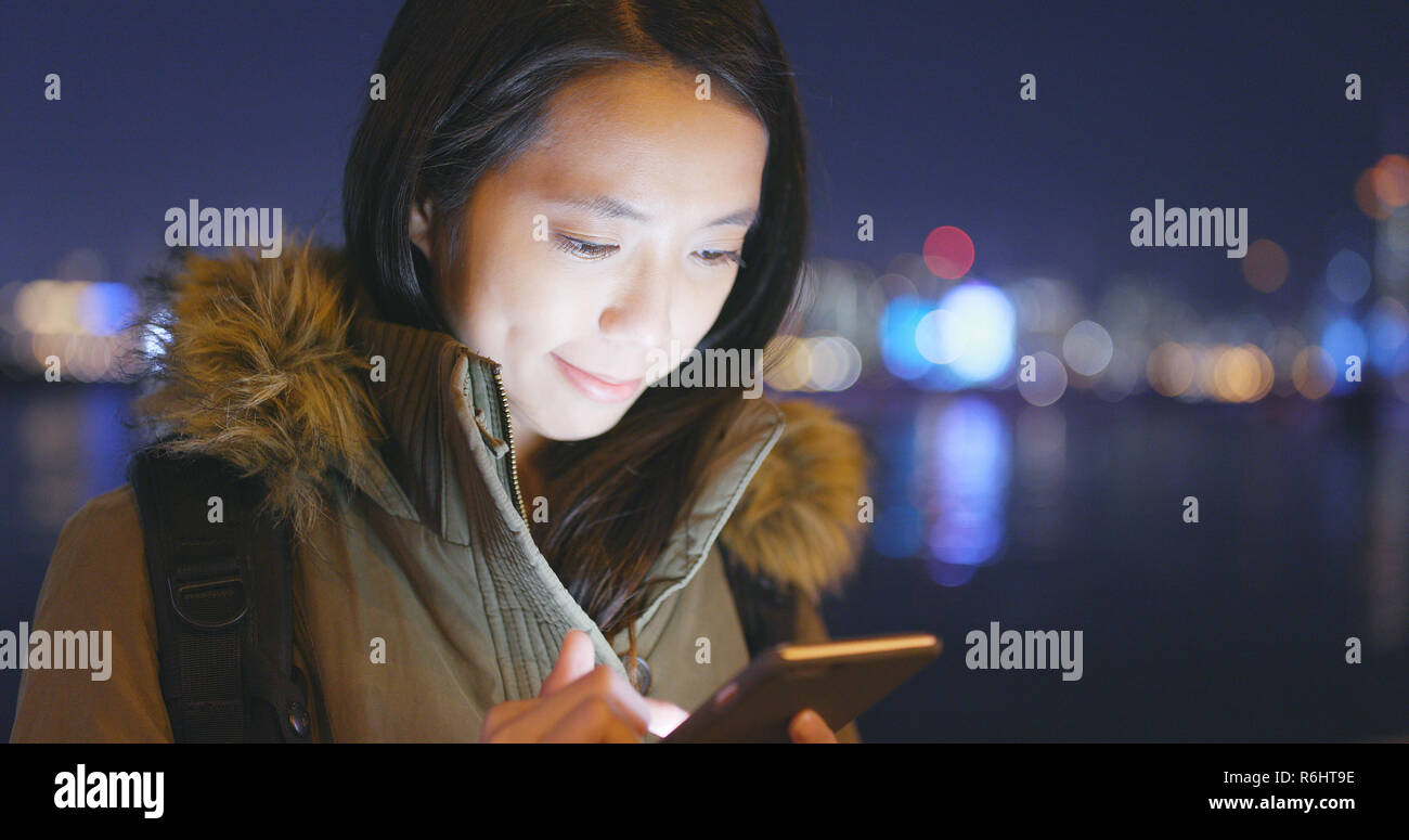 Asian Woman use of smart phone in Hong Kong Stock Photo - Alamy