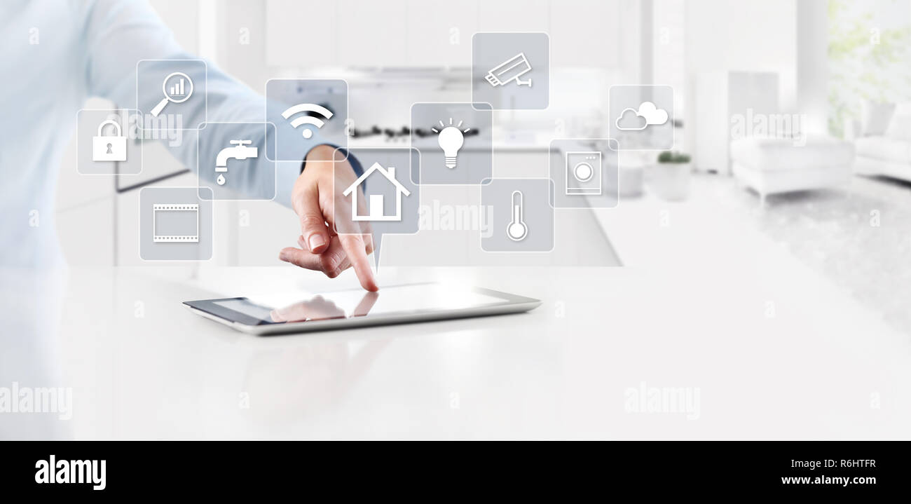 smart home automation control concept hand touch digital tablet screen ...