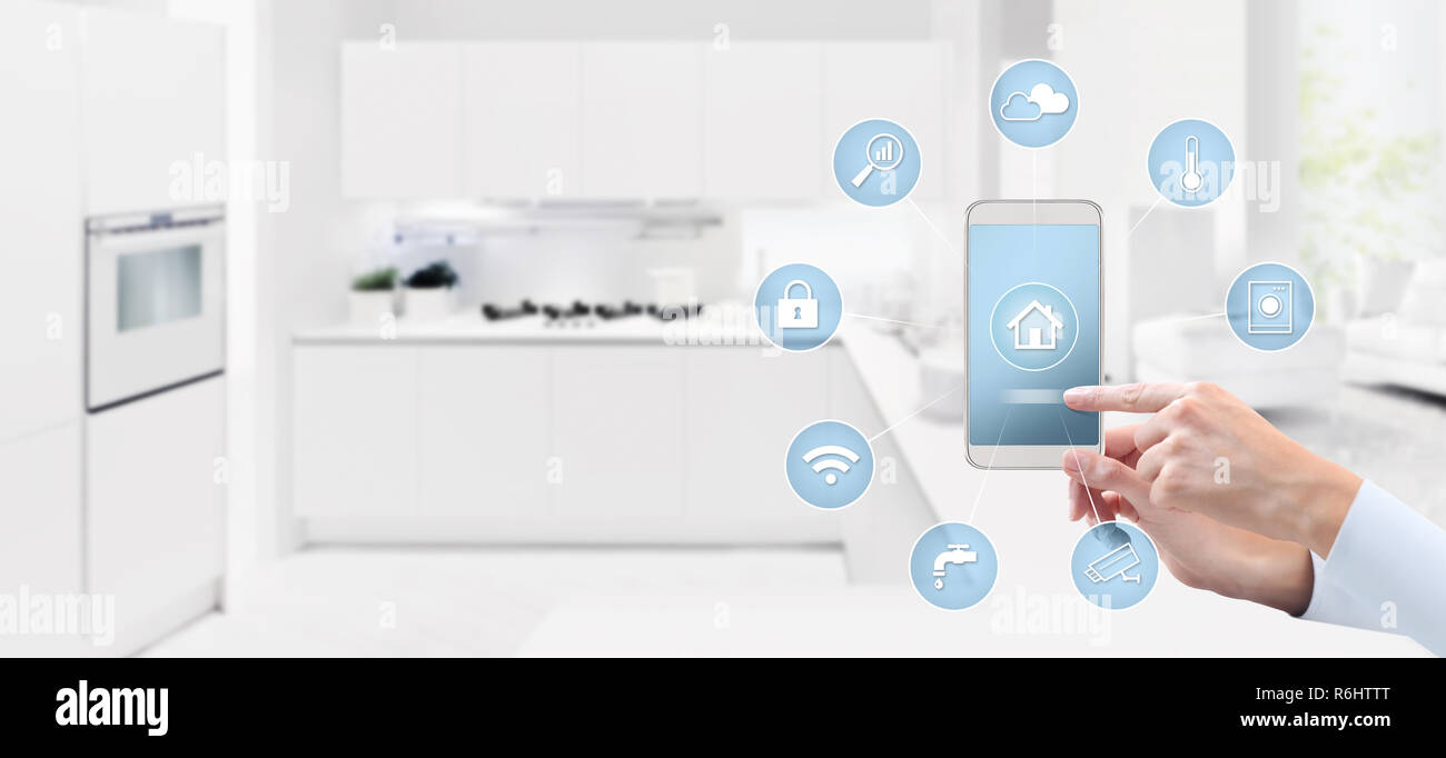 smart home automation control concept hand touch cell phone screen with ...