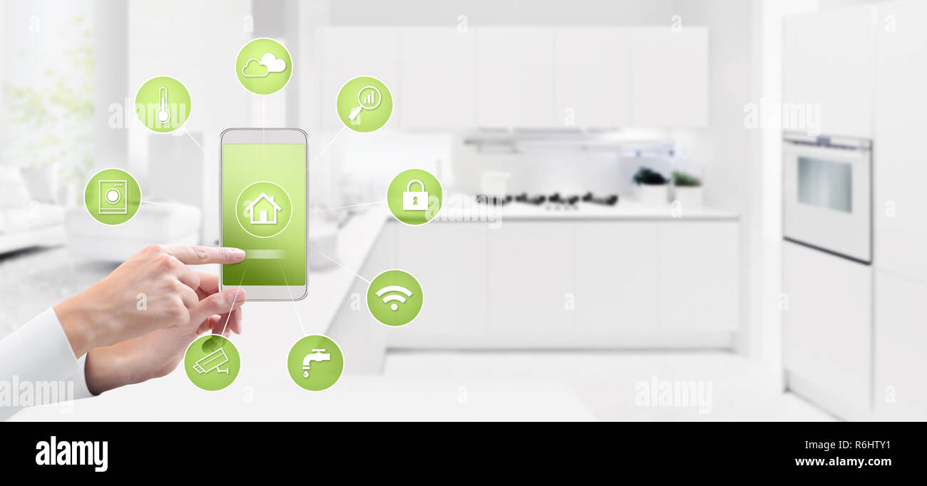 smart home automation control concept hand touch cell phone screen with ...