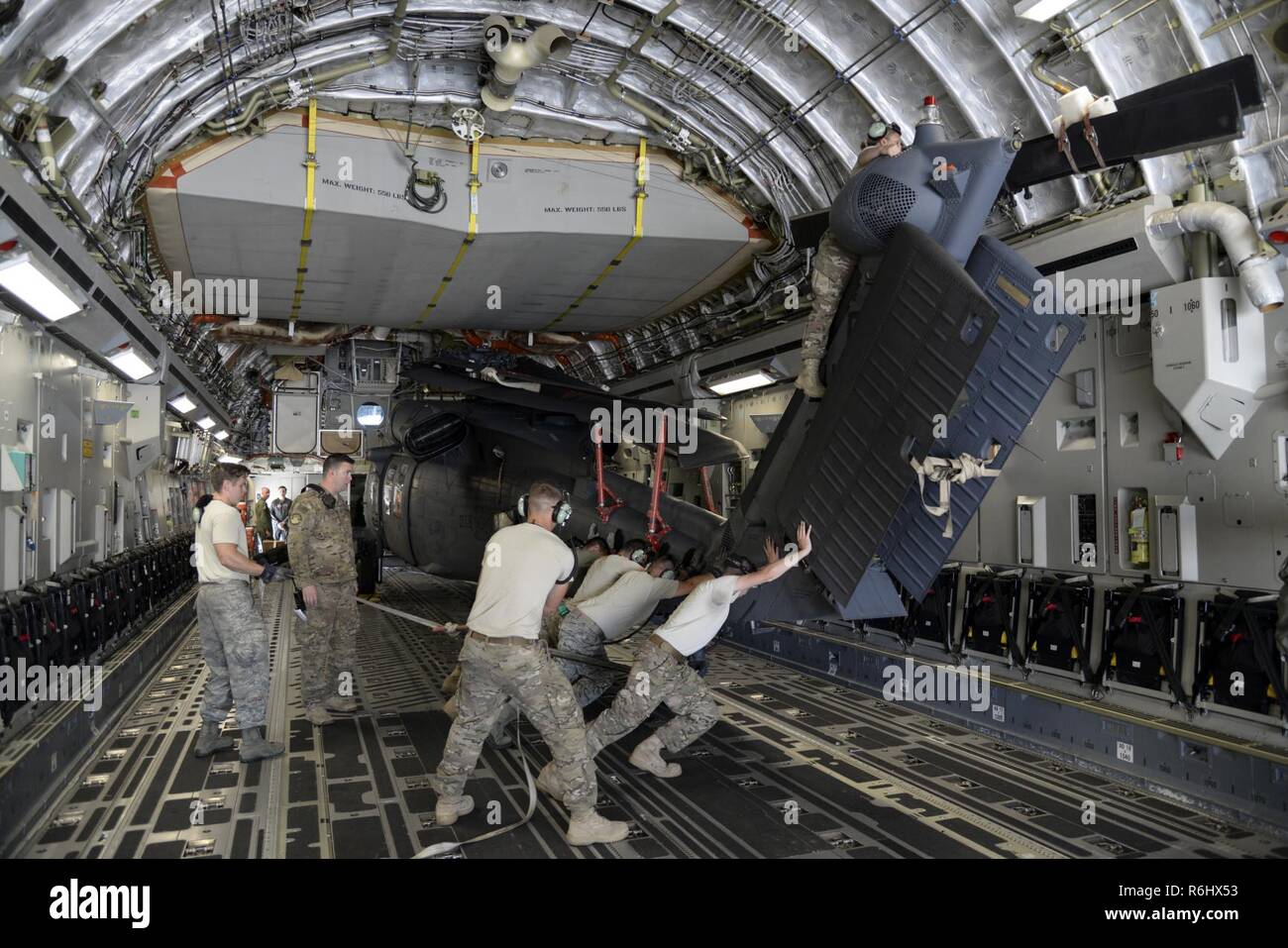 Members of the 723d Aircraft Maintenance Squadron, 41st Helicopter