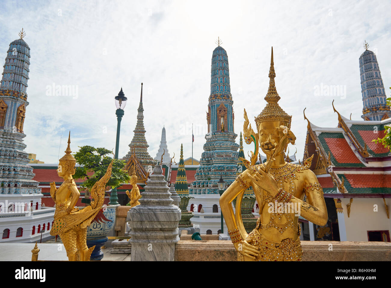 Golden dancer statues inside the Grand Palace in Bangkok, Thailand. Stock Photo