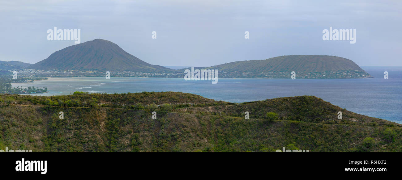 Koko Crater and Koko Head beyond the tip of Diamond Head crater, Oahu
