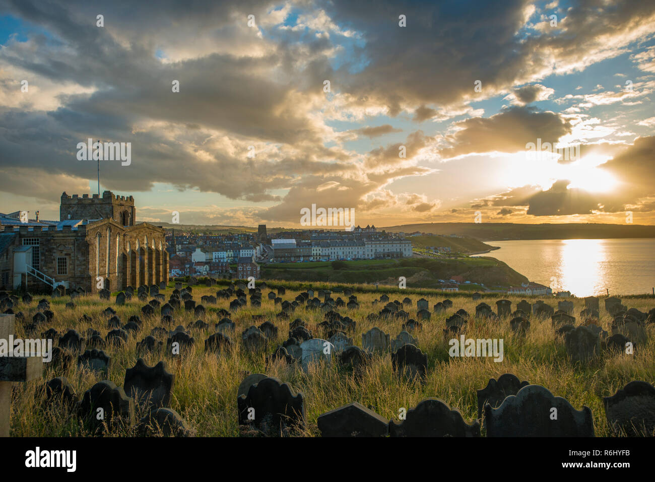 Graveyard in Whitby. Whitby is a seaside town, port and civil parish in the Borough of Scarborough and English county of North Yorkshire, August 2017 Stock Photo