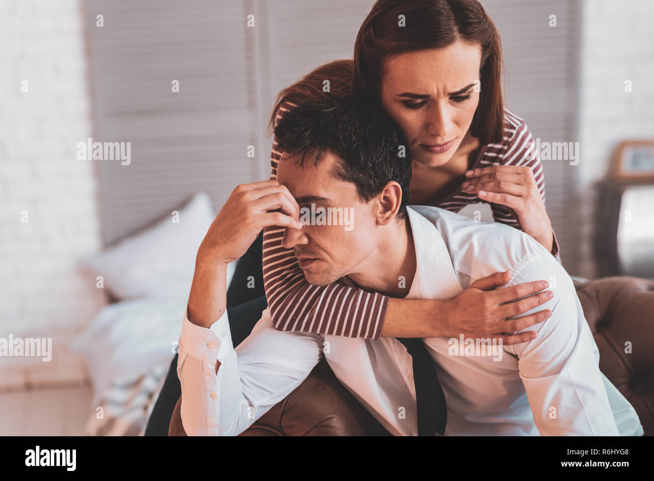 Loving couple hugging her waist close up - Stock Image - Everypixel