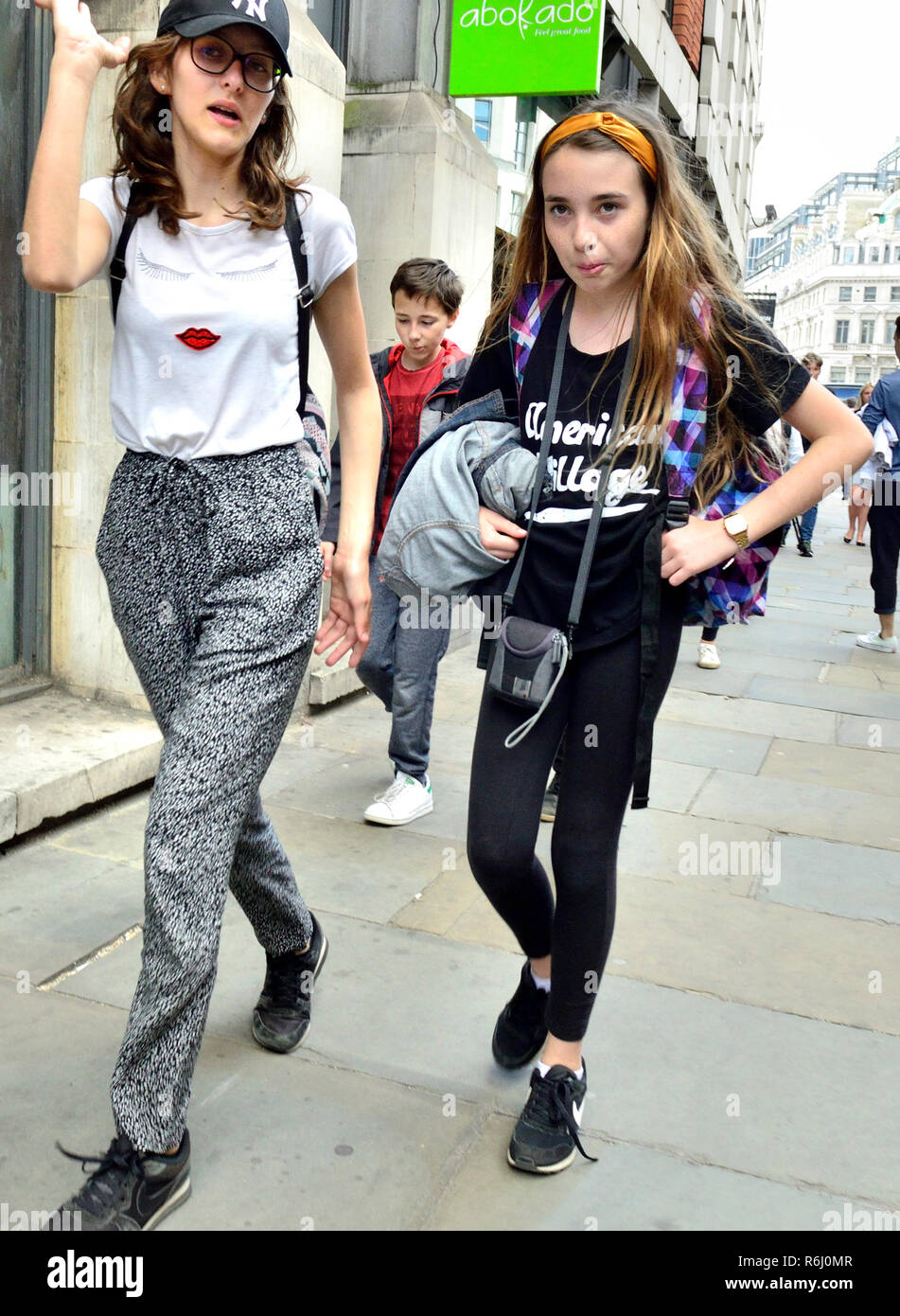 girls walking in yoga pants