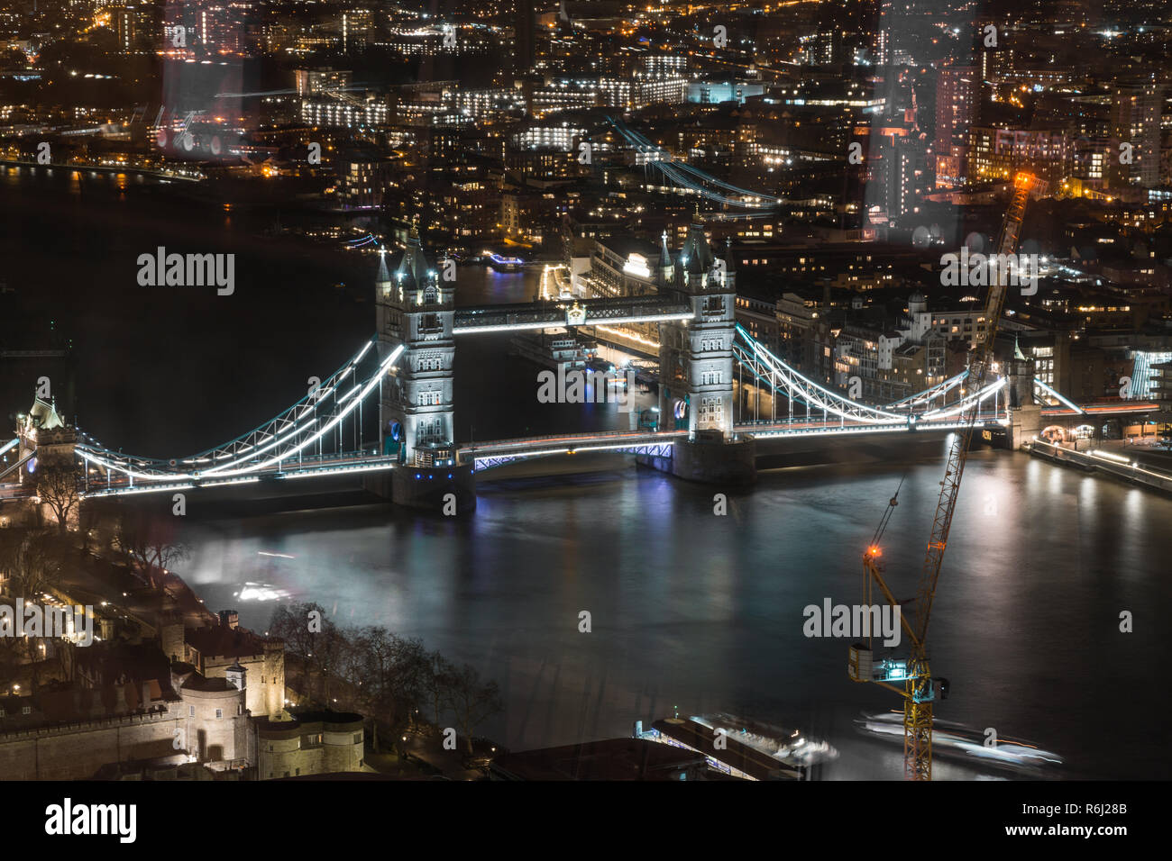 London, England - Tower Bridge and River Thames aerial view with reflections. Stock Photo